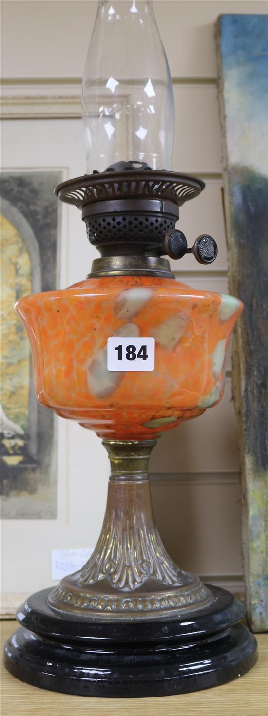 A brass columned oil lamp